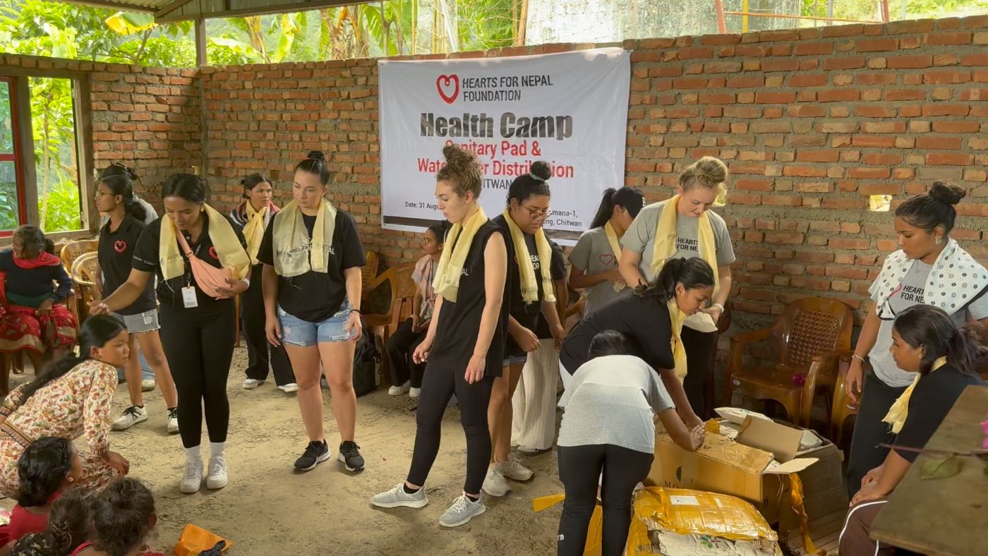 The Hearts for Nepal team at a health camp for sanitary pad and water filter distribution in Chitwan