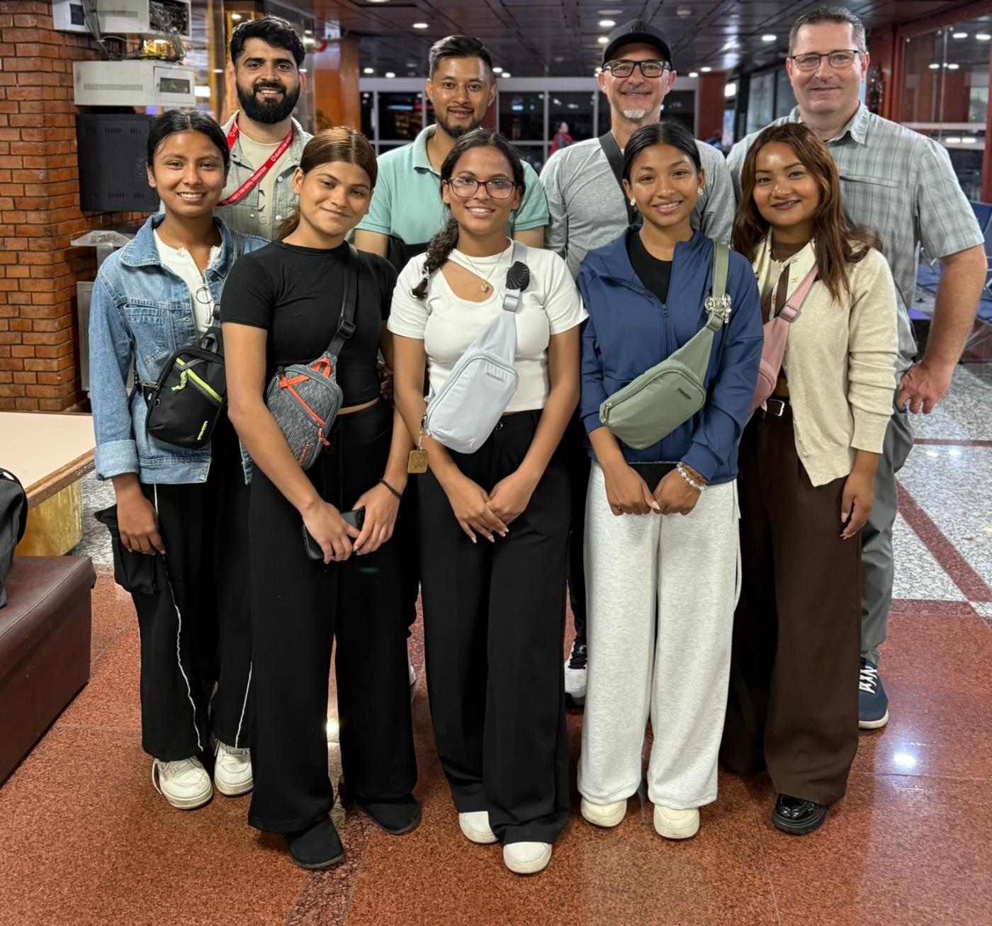 The team and girls departing Kathmandu airport for Istanbul