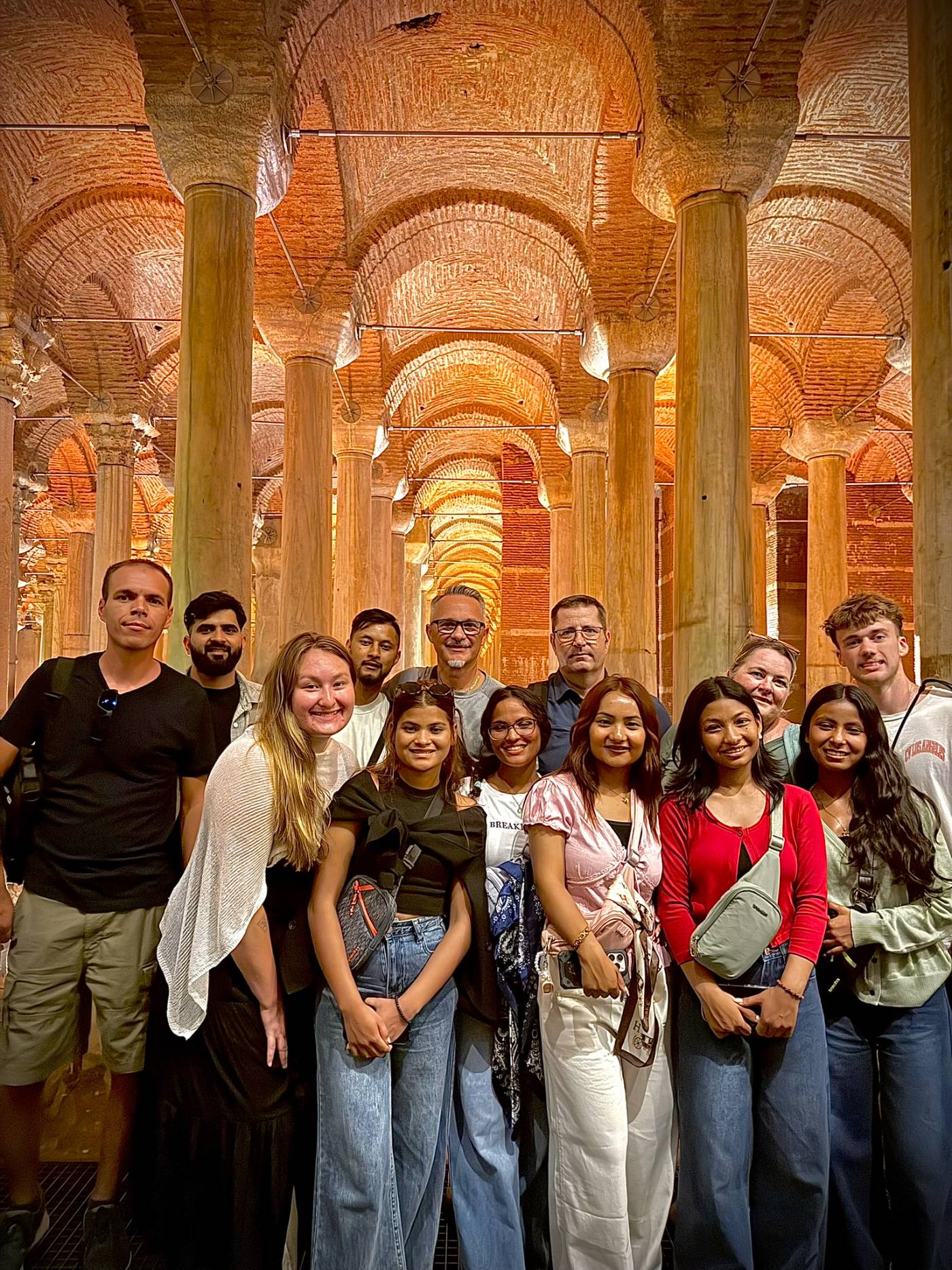 The Hearts for Nepal team and girls beneath the columns of the Basilica Cistern in Istanbul
