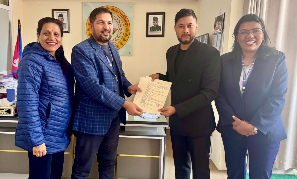 Hearts for Nepal team receiving the municipality's formal recognition at the Suryabinayak Municipality office